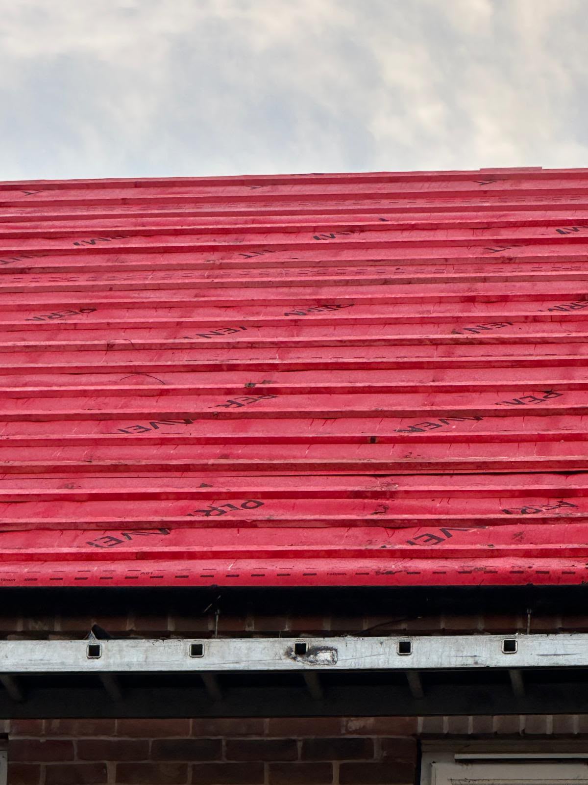 New roof membrane and battens finished neatly at the eaves with ventilation